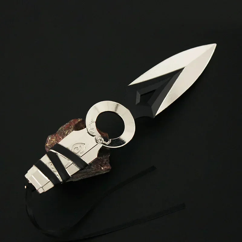 Kunai knife keychain with silver ring and black handle, white double-blade design