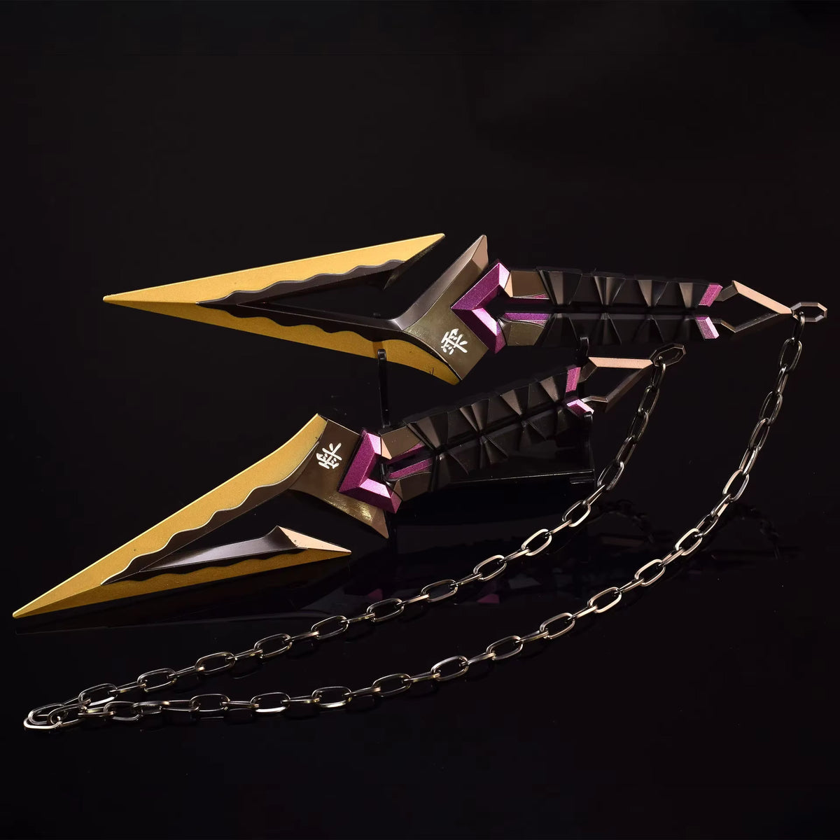 Kuronami VALORANT knife keychain, black body with purple blocks and gold blade edges