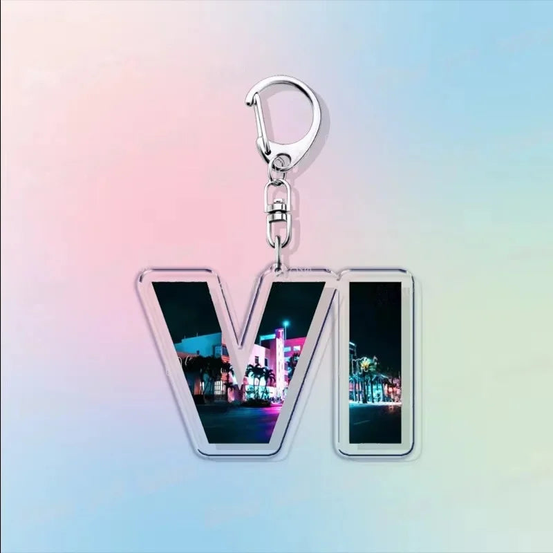 Acrylic keychain with two photo-style window panels on a clear tag