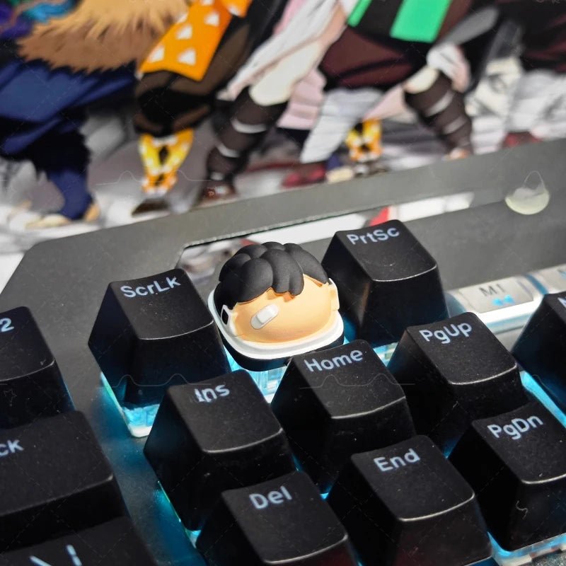 Gaming keyboard keycaps with custom face key at center, black keys labeled Home, PgUp, Del