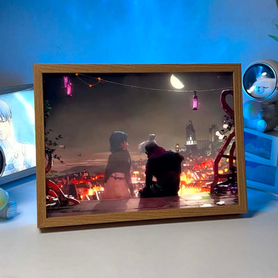 Framed LED lighting canvas with illustrated figures and multicolor glowing string lights
