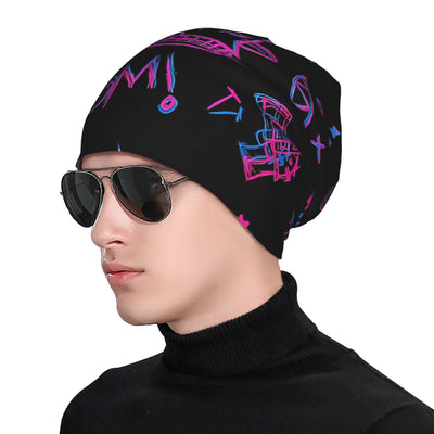 Black slouch beanie with graffiti print on a model wearing sunglasses