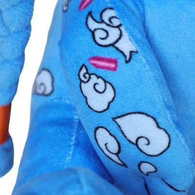 Blue plush fabric detail with white cloud graphics and visible stitching
