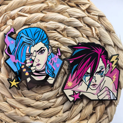 Set of two character enamel pins, blue and magenta hair portraits