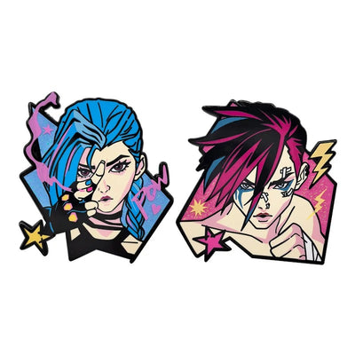 Two character enamel pins side by side, blue and magenta hair portraits