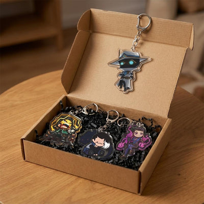 Set of acrylic character keychains in a box, each with a silver clasp