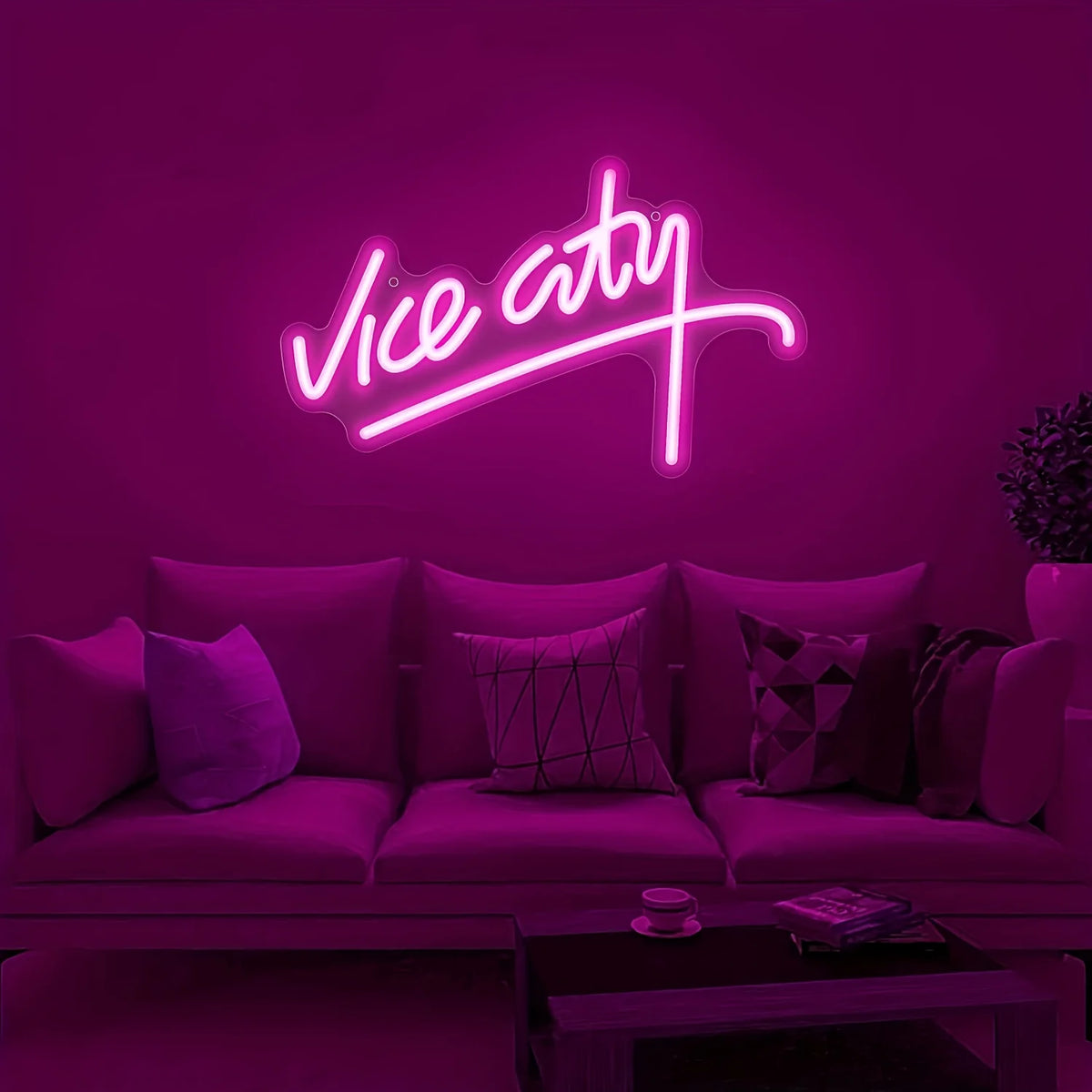 Neon sign reading 'Vice City' in a purple-themed living room.