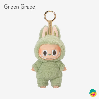 Green grape plush-style monster vinyl keychain toy with hood, bunny ears, and big eyes