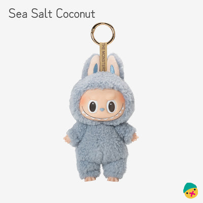 Sea salt coconut plush-style monster vinyl keychain toy, blue fuzzy hood and big eyes