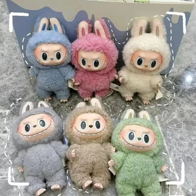 Set of six cute monster vinyl toys, each in fuzzy hooded outfit with big eyes