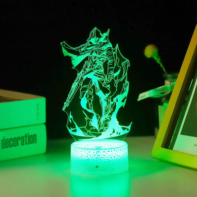 Acrylic LED lamp with character graphic lit in green on a glowing white round base.
