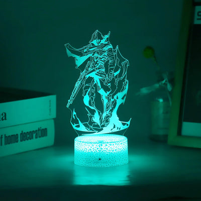 Acrylic LED lamp with character graphic lit in blue on a glowing white round base.