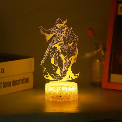 Acrylic LED lamp with character graphic lit in warm yellow on a glowing white base.