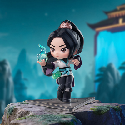 Sage A chibi-style collectible figurine of a female warrior character standing on a clear display base, holding a glowing blue orb, set against a stylized blue fantasy landscape with a traditional building in the background.