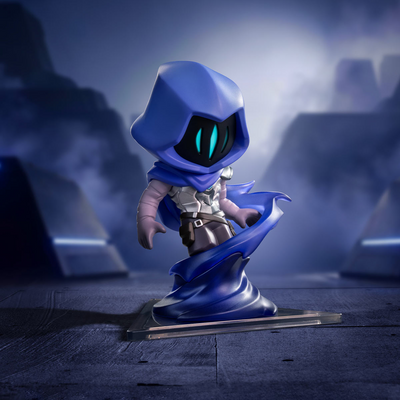 Omen A stylized blue hooded fantasy character figurine or collectible stand, posed on a dark platform in a misty blue scene. The figure has glowing cyan eyes, pale skin, and a flowing blue cape-like base, with no visible brand text.