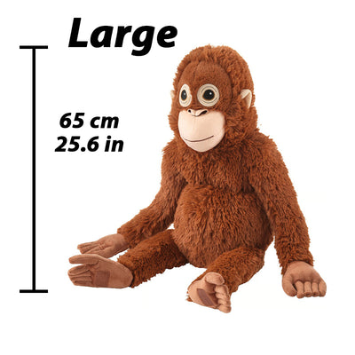 Large brown plush monkey toy, big eyes, smiling face, arms and legs out.