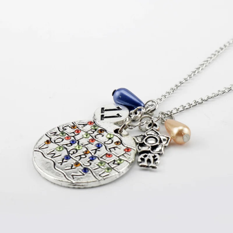 Stranger Things Inspired 4-Piece Jewelry Collection: Alphabet Wall, Demogorgon & "Friends Don't Lie" Charms