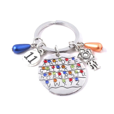 Stranger Things Inspired 4-Piece Jewelry Collection: Alphabet Wall, Demogorgon & "Friends Don't Lie" Charms
