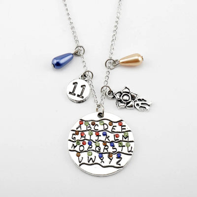 Stranger Things Inspired 4-Piece Jewelry Collection: Alphabet Wall, Demogorgon & "Friends Don't Lie" Charms