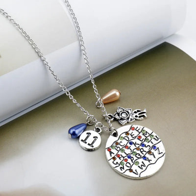 Stranger Things Inspired 4-Piece Jewelry Collection: Alphabet Wall, Demogorgon & "Friends Don't Lie" Charms