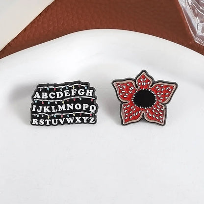 Stranger Things Iconic Enamel Pin Collection - Demogorgon, Alphabet Wall, & Adopt Me Designs