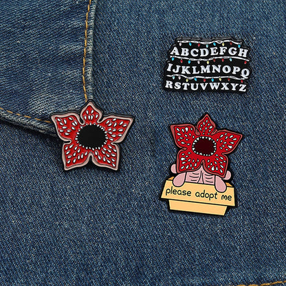 Stranger Things Iconic Enamel Pin Collection - Demogorgon, Alphabet Wall, & Adopt Me Designs