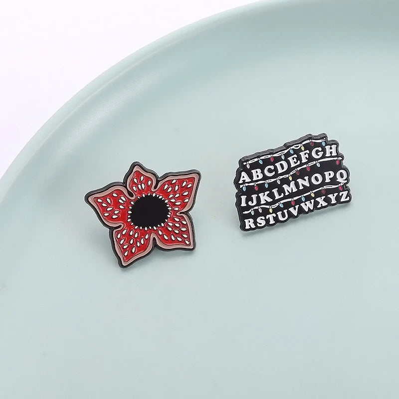 Stranger Things Iconic Enamel Pin Collection - Demogorgon, Alphabet Wall, & Adopt Me Designs