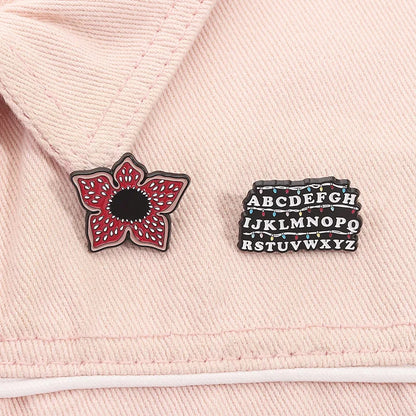 Stranger Things Iconic Enamel Pin Collection - Demogorgon, Alphabet Wall, & Adopt Me Designs
