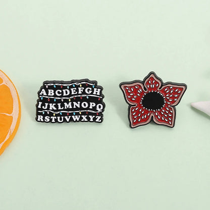 Stranger Things Iconic Enamel Pin Collection - Demogorgon, Alphabet Wall, & Adopt Me Designs
