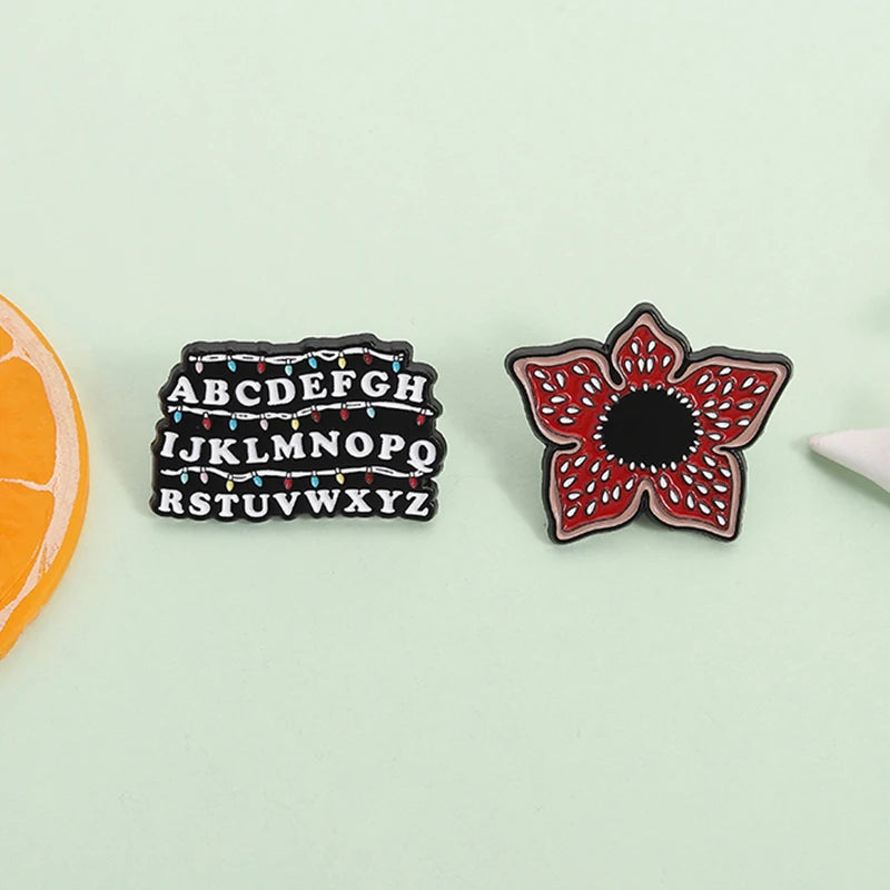 Stranger Things Iconic Enamel Pin Collection - Demogorgon, Alphabet Wall, & Adopt Me Designs