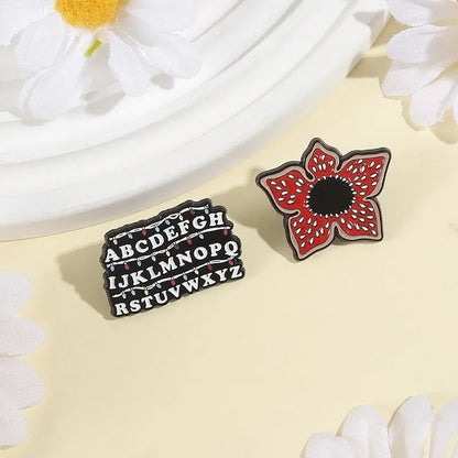 Stranger Things Iconic Enamel Pin Collection - Demogorgon, Alphabet Wall, & Adopt Me Designs