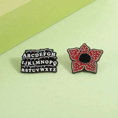Stranger Things Iconic Enamel Pin Collection - Demogorgon, Alphabet Wall, & Adopt Me Designs