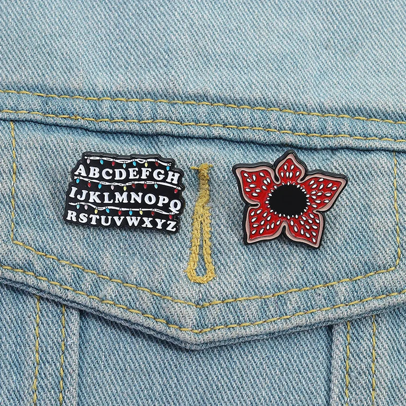 Stranger Things Iconic Enamel Pin Collection - Demogorgon, Alphabet Wall, & Adopt Me Designs