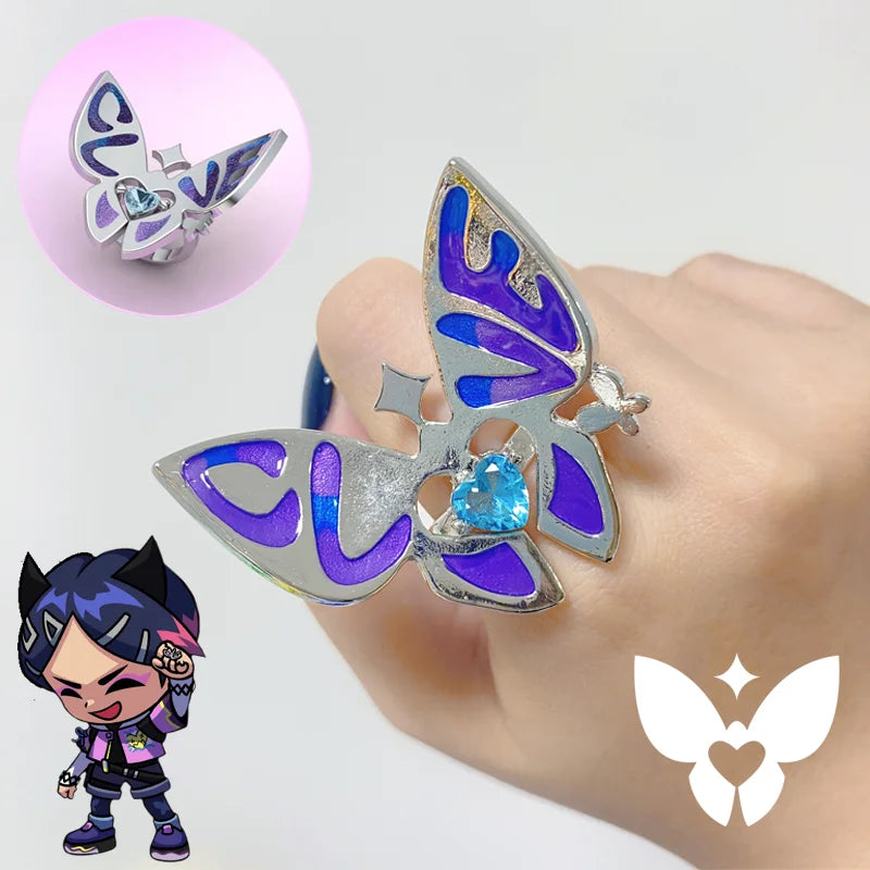 Butterfly ring with purple-blue enamel wings and light-blue crystal cluster