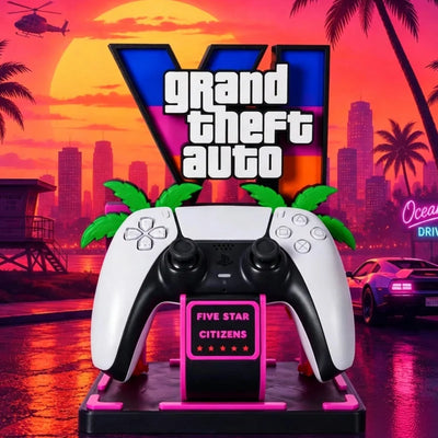 Gaming controller holder ornament with black controller on pink base and pink “Five Star Citizens” card