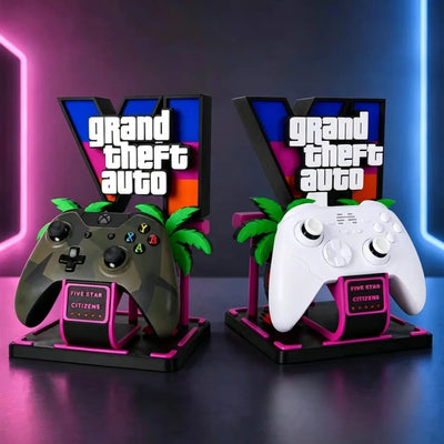 Pair of gaming controller holder ornaments with black and white controllers, palm details, pink bases
