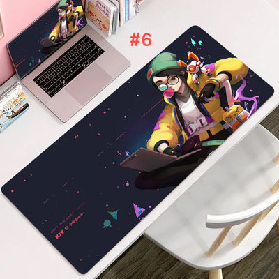 Gaming mouse pad with colorful anime action character and star-splatter accents