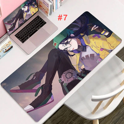 Gaming mouse pad with purple-blue anime character wearing headphones and visor
