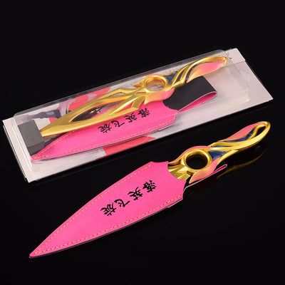 Kunai knife with pink sheath and gold blade, multicolor accent ring and black cutout