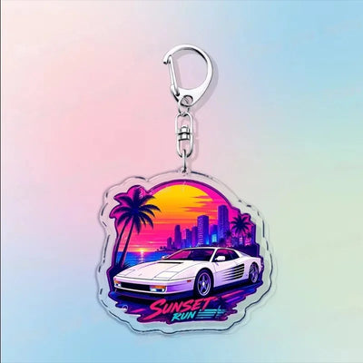 Acrylic keychain with a car illustration and “Sunset” text