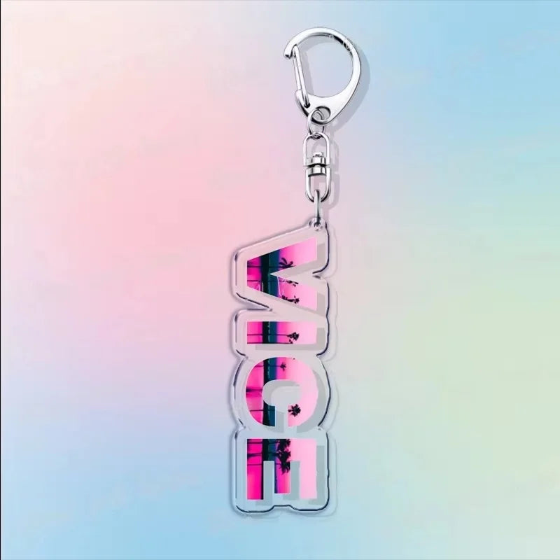 Silver hook acrylic keychain with stacked “VI” lettering in pink, purple, and black.