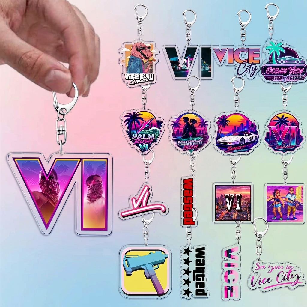 Assorted acrylic keychains with colorful icons and metal keyrings, held in hand