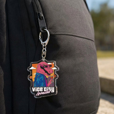 Acrylic keychain on a black backpack strap with “Vice City Leonida” logo.