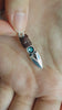 Load and play video in Gallery viewer, Jett Knife Necklace with Blue Crystal