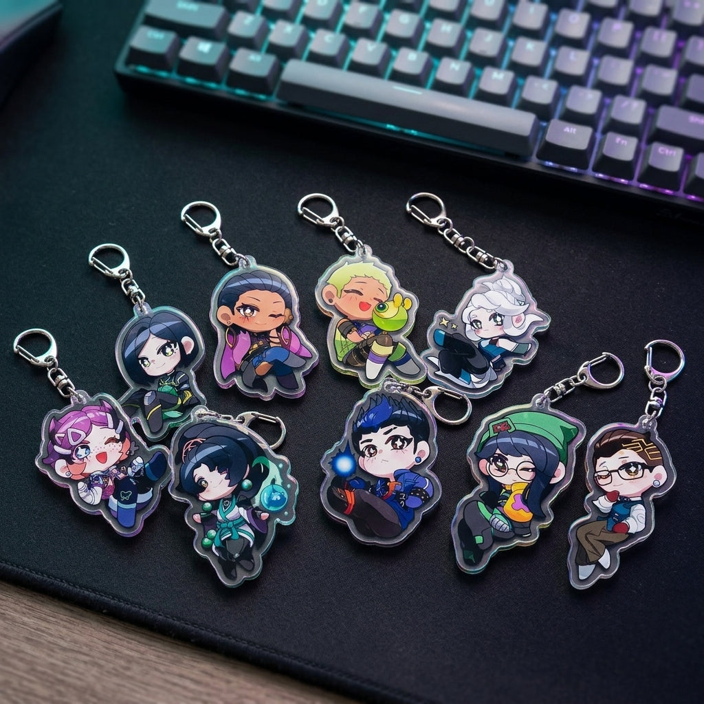 Set of chibi agent acrylic keychains charms with different faces on a desk near keyboard