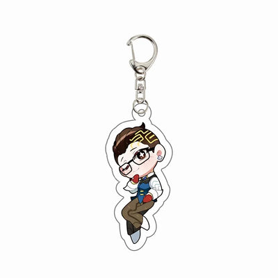 Chibi agent acrylic keychain charm with glasses, brown hair, and red tongue