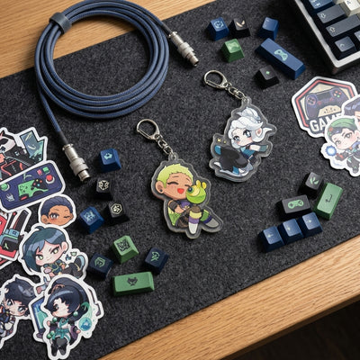 Chibi agent acrylic keychain set with braided blue cord and metal keyrings