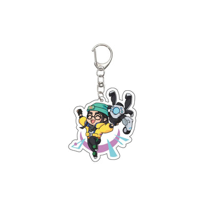 Acrylic chibi character keychain showing a group with yellow and teal outfits