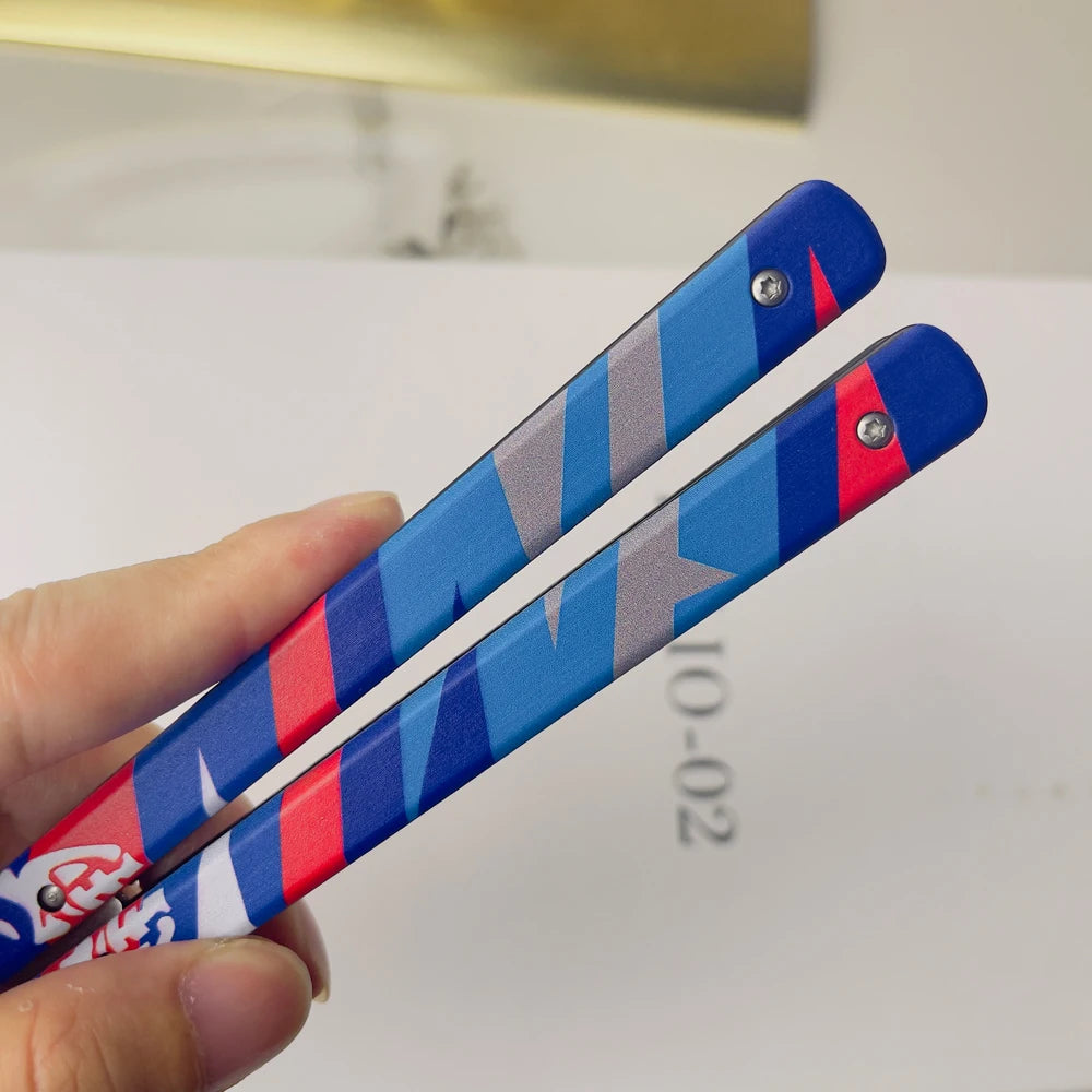 Close-up of blue/red patterned comb knife blade with engraved marking 6.02