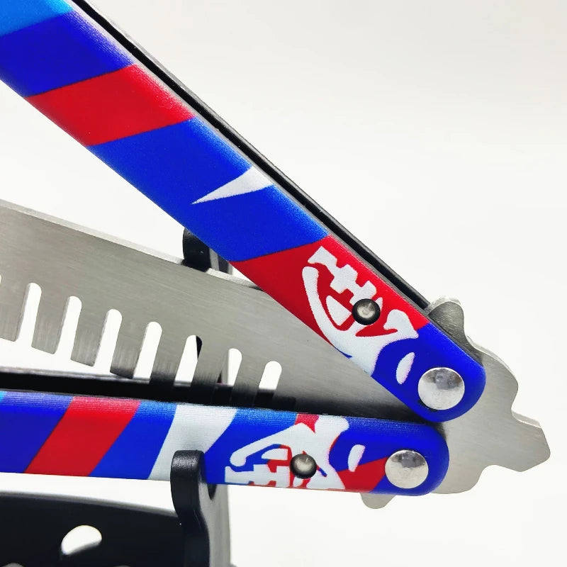 Close-up handles of blue and red butterfly knife comb with grip rivets